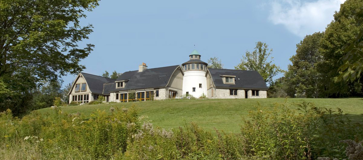 Main_residence_overlooks_fields_and_stone_walls